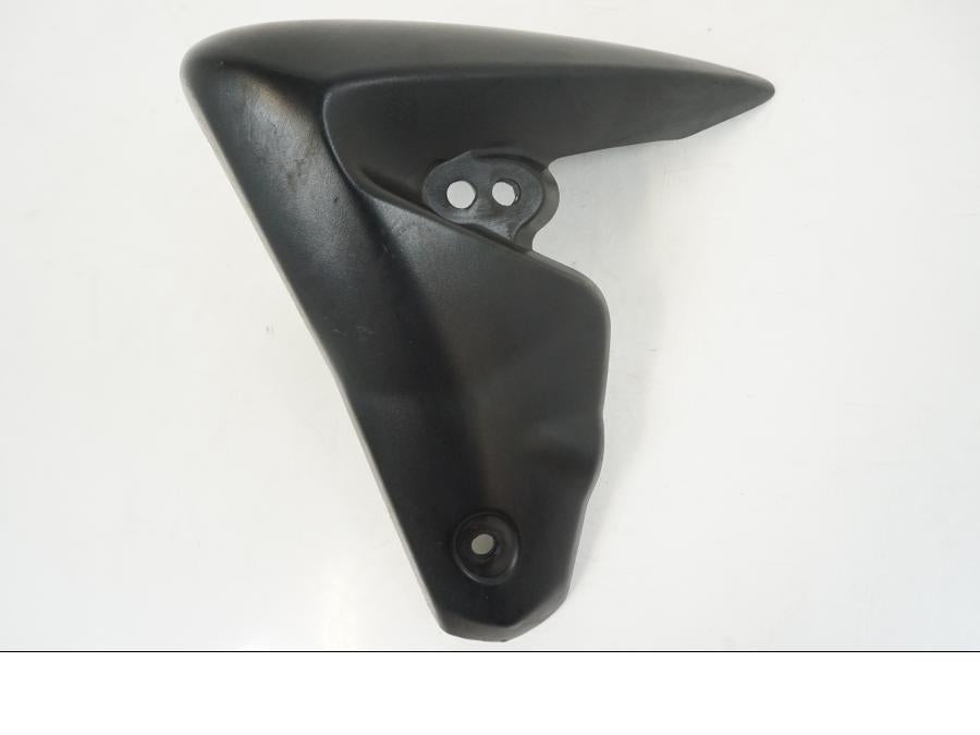 Framsidan på Kylarvinge från en Triumph Speed Triple -2009 motorcykel.