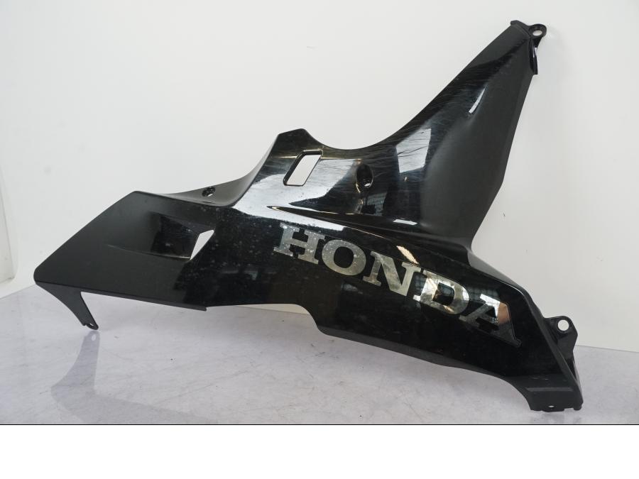 Vänster sida på Magkåpa från en Honda CBR 600 -2008 motorcykel.