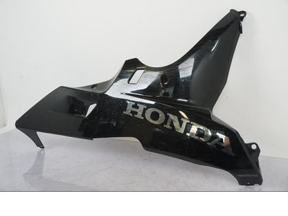 Vänster sida på Magkåpa från en Honda CBR 600 -2008 motorcykel.