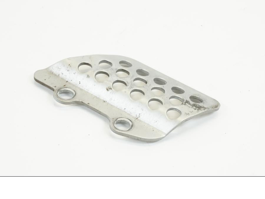 Baksidan på Fotpinnehälskydd från en Kawasaki ZX-12R -2000 motorcykel.