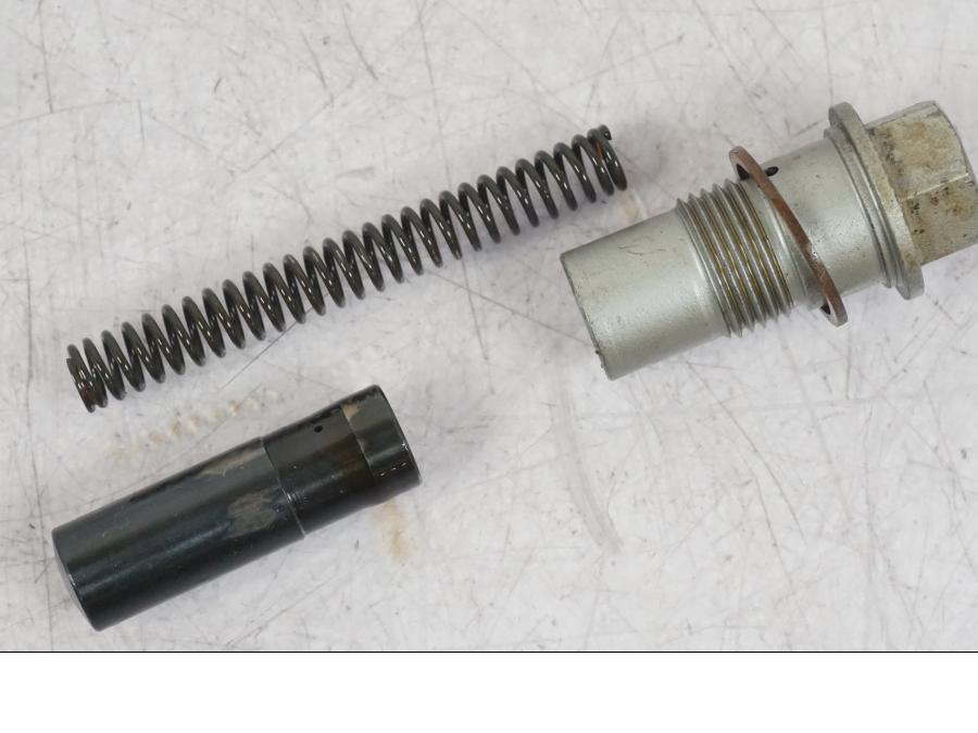 Vänster sida på Kamkedjesträckare från en BMW R 1200 GS -2018 motorcykel.