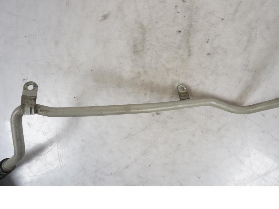 Snett uppifrån på Oljekylslang från en BMW R 1150 GS -2002 motorcykel.