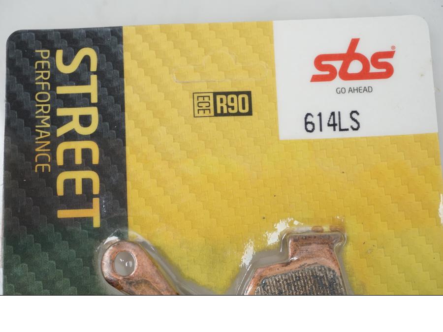 Höger sida på Bromsbelägg från en Universal Universal -1997 motorcykel.