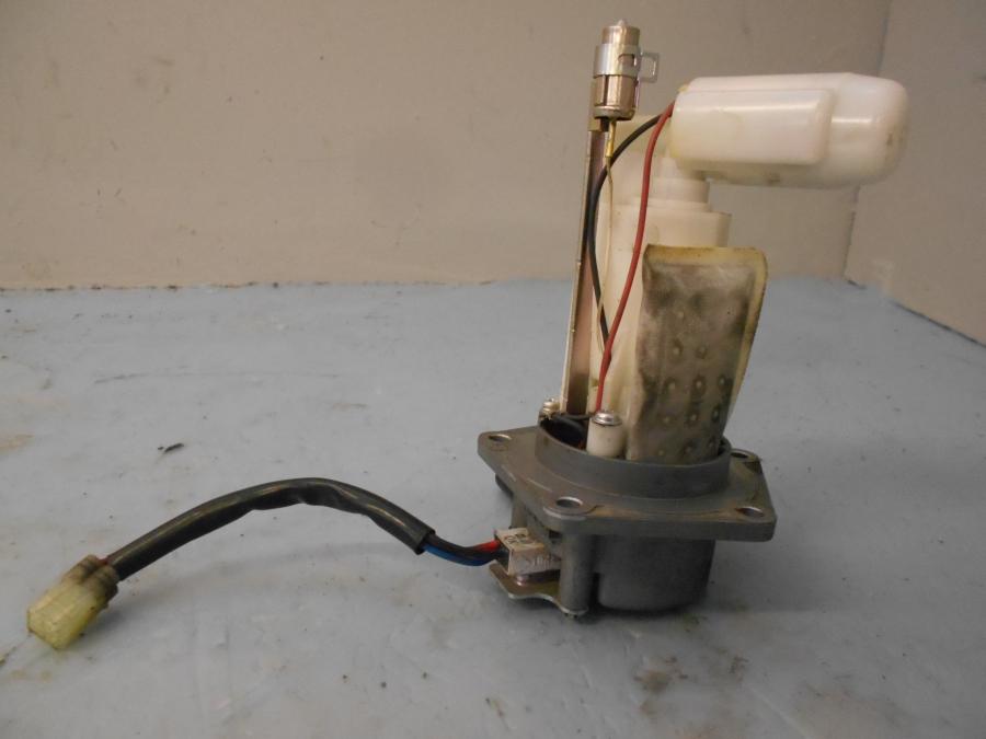 Framsidan på Bensinpump insprut från en Kawasaki Versys 650 -2007 motorcykel.