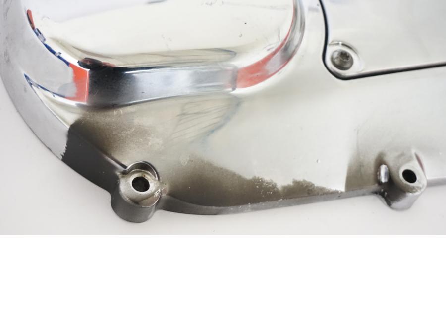 Vänster sida på Transmissionskåpa från en H-D Electra Glide FLHT -2003 motorcykel.