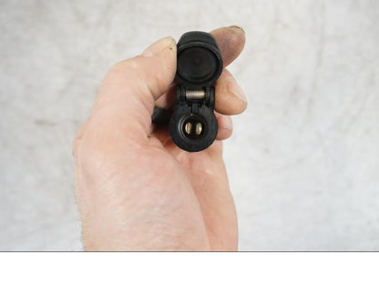 Framsidan på El uttag 12 V från en BMW S 1000 XR -2019 motorcykel.