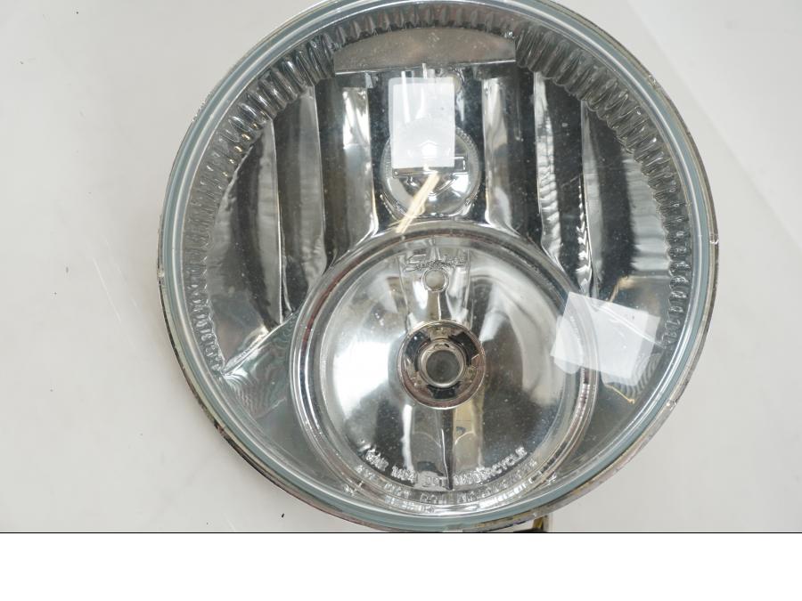 Vänster sida på Strålkastare från en H-D Touring Road King FLHRC -2007 motorcykel.