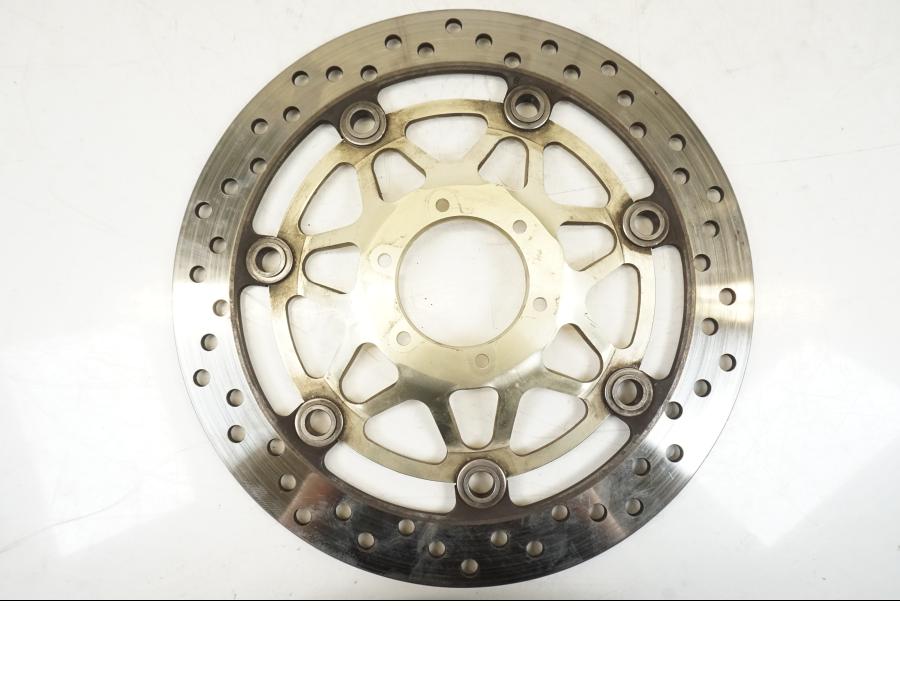 Framsidan på Bromsskiva från en Honda VFR 800 -2003 motorcykel.