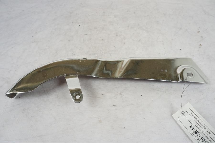 Framsidan på Kedjeskydd från en Triumph Bonneville T120 -2021 motorcykel.