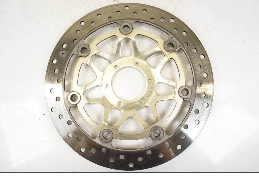 Vänster sida på Bromsskiva från en Honda VFR 800 -2003 motorcykel.