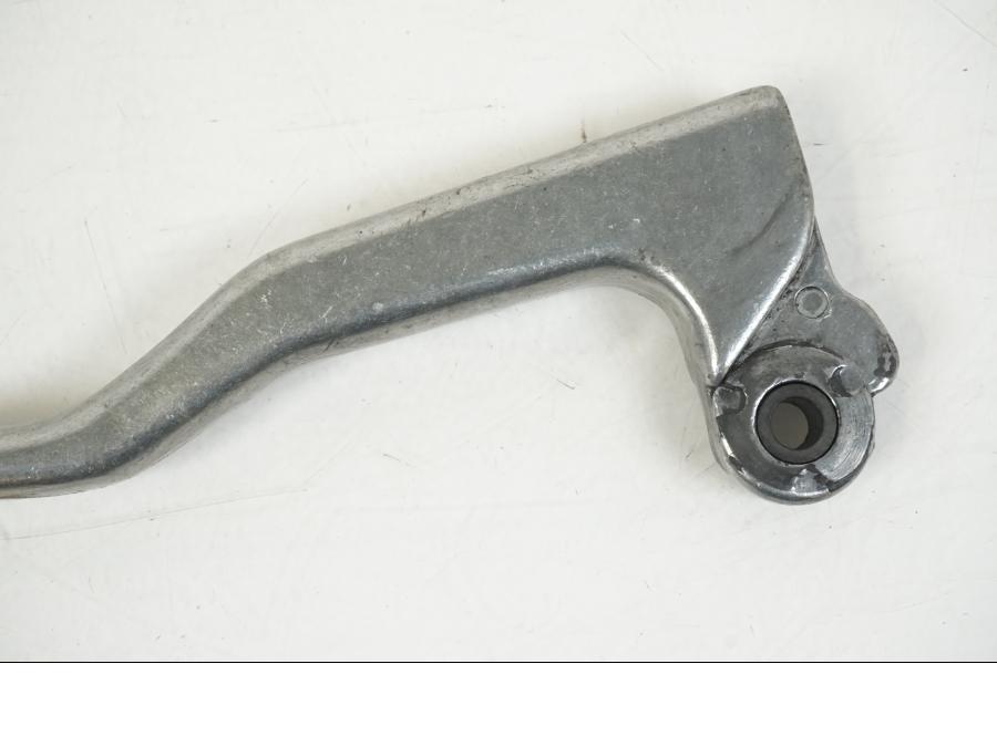 Baksidan på Kopplingsgrepp från en Aprilia RS 250 -1998 motorcykel.