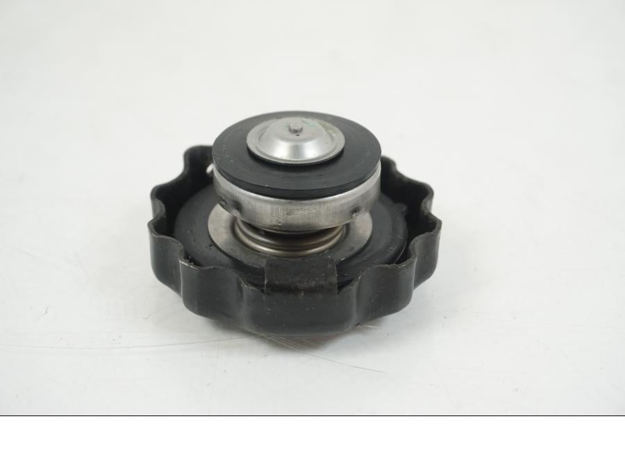 Snett uppifrån på Vattenkyllock från en Honda CBR 125 R -2006 motorcykel.