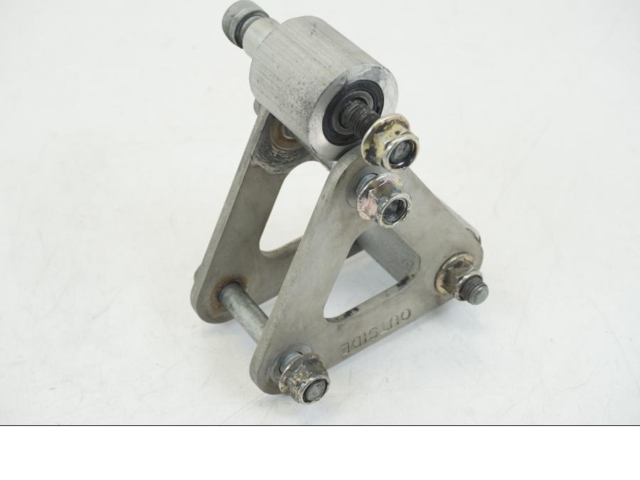 Vänster sida på Stötdämparlänkage från en Triumph TT 600 -2002 motorcykel.