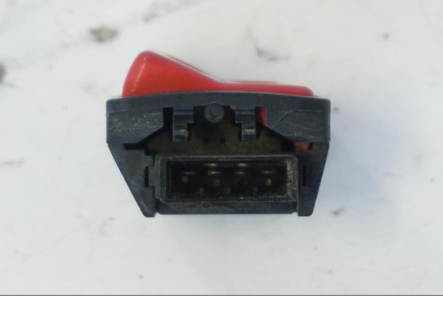 Baksidan på Tryckknappsreglage från en Honda SH 300 A -2011 scooter.