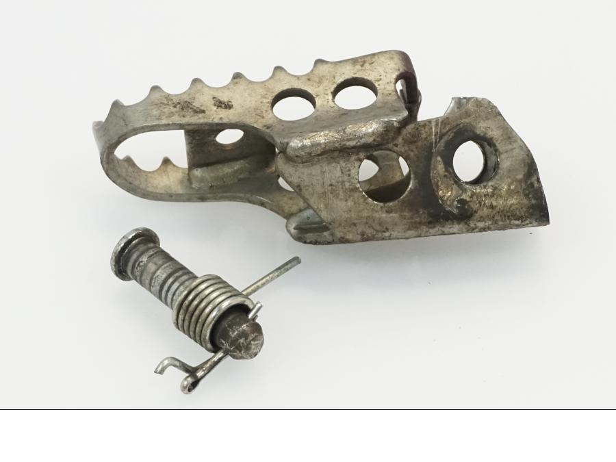 Höger sida på Fotpinne från en Yamaha WR 125 -2010 motorcykel.