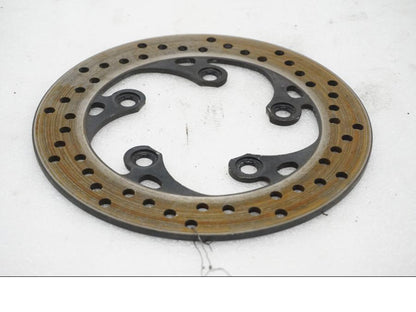 Framsidan på Bromsskiva från en Suzuki SV 1000 -2007 motorcykel.