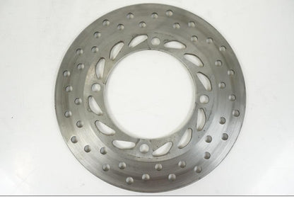 Snett uppifrån på Bromsskiva från en Honda CBR 125 R -2006 motorcykel.