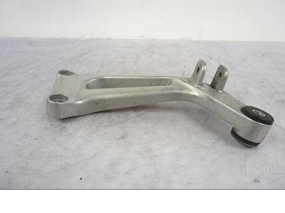 Vänster sida på Fotpinnefäste från en Honda VTR 1000 F -1997 motorcykel.