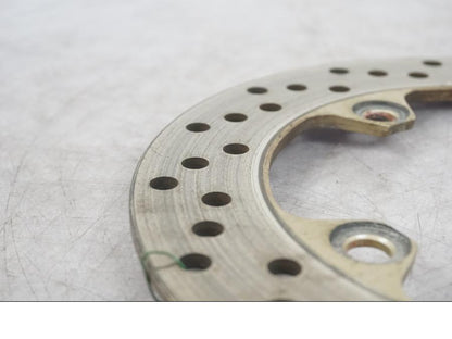 Framsidan på Bromsskiva från en Kawasaki ZX-6R -2002 motorcykel.