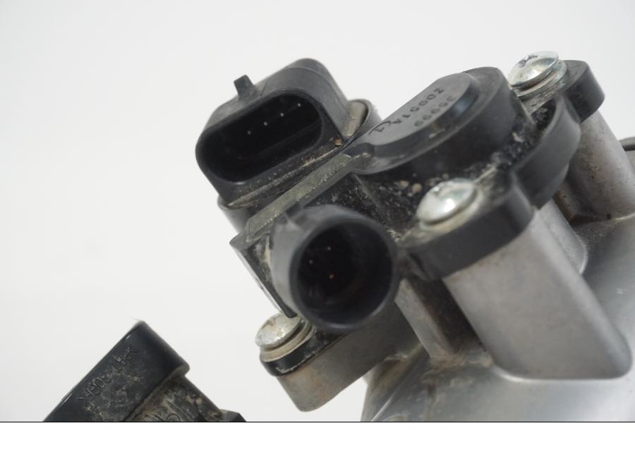 Baksidan på Spjällhus från en AJP PR7 -2021 motorcykel.