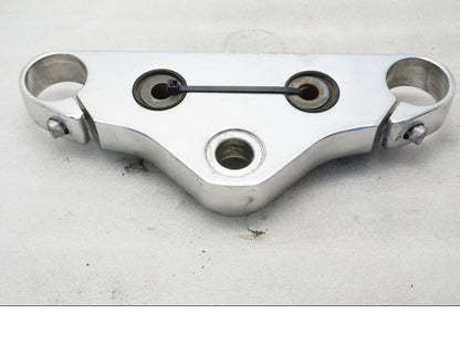 Framsidan på Gaffelkrona från en Yamaha XVS 650 -1999 motorcykel.