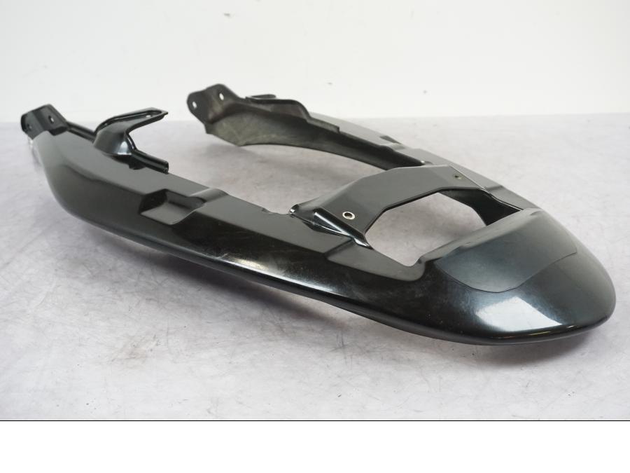 Vänster sida på Bakvinge från en Triumph Tiger -2009 motorcykel.