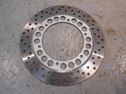 Framsidan på Bromsskiva från en Yamaha XV 1100 -1996 motorcykel.