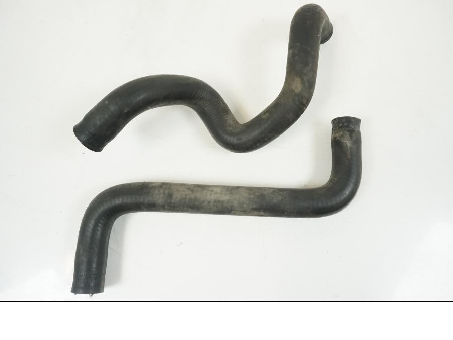 Snett uppifrån på Vattenkyl Slang Set från en Honda CBR 125 R -2006 motorcykel.