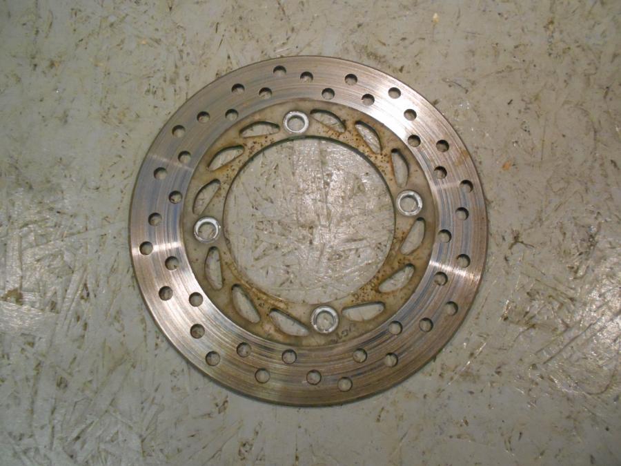 Framsidan på Bromsskiva från en Honda CBR 125 R -2007 motorcykel.