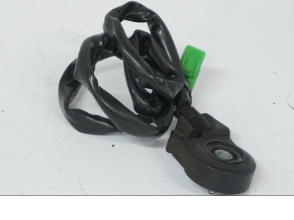 Baksidan på Sidostödsbrytare från en Honda CB 500 X -2015 motorcykel.