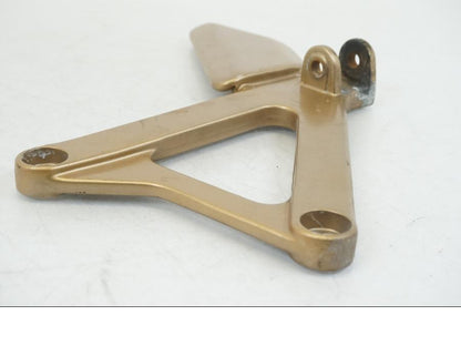 Vänster sida på Fotpinnefäste från en Honda NSR 125 -1991 motorcykel.