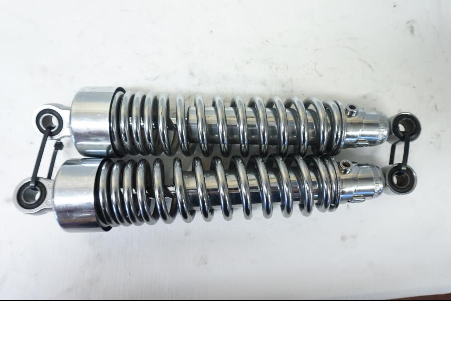 Baksidan på Stötdämpare från en Triumph Bonneville -2001 motorcykel.