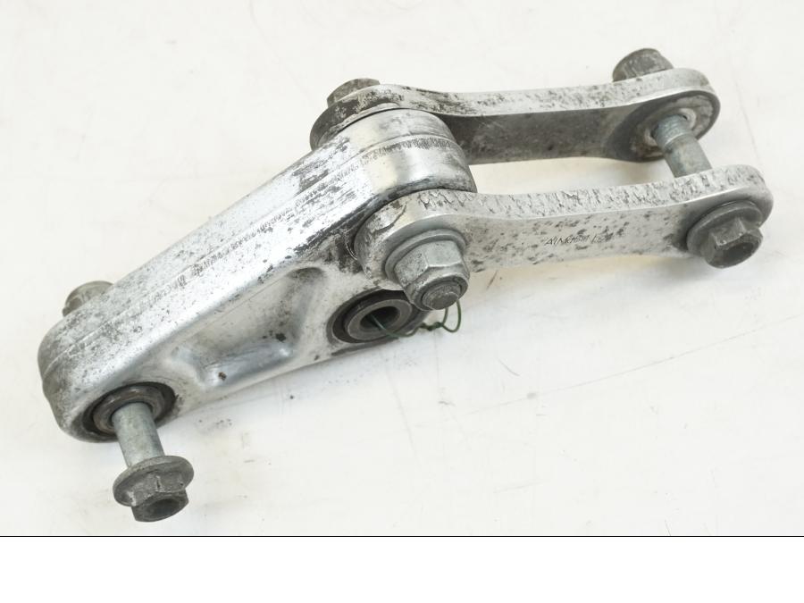 Vänster sida på Stötdämparlänkage från en BMW F 650 CS -2003 motorcykel.