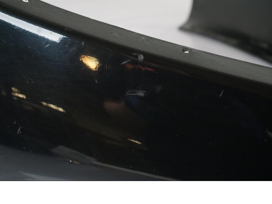 Baksidan på Bakvinge från en Aprilia RS 125 -2000 motorcykel.