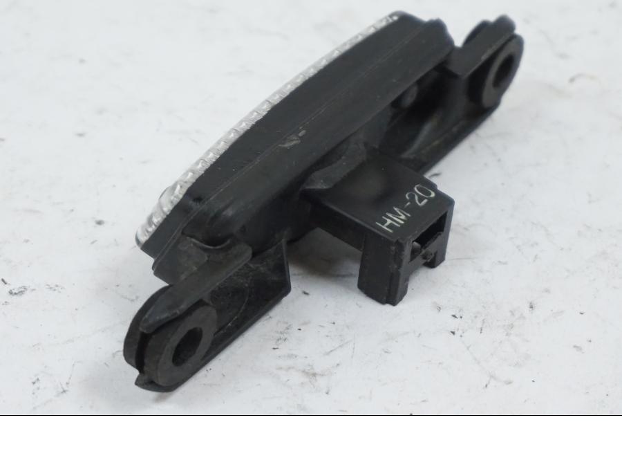 Vänster sida på Parkeringsljus från en Suzuki SV 650 -1999 motorcykel.