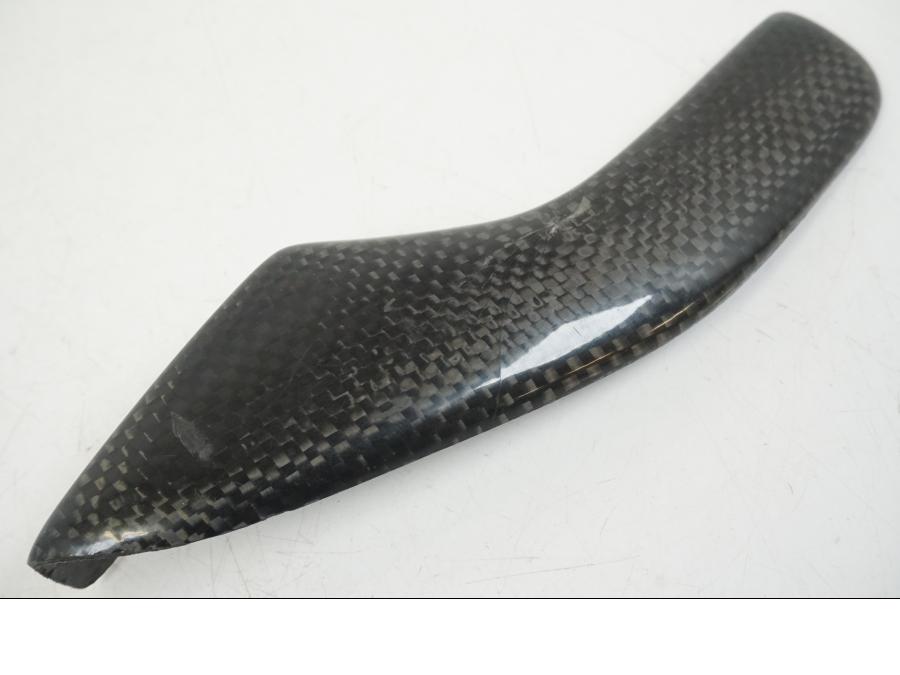 Vänster sida på Kedjeskydd från en Aprilia RS 125 -2008 motorcykel.