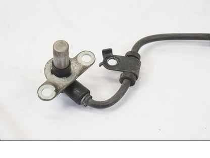 Baksidan på ABS givare från en Honda NT 700 -2008 motorcykel.