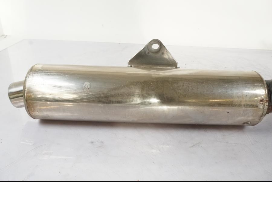 Baksidan på Avgassystem från en Honda CBR 125 R -2006 motorcykel.