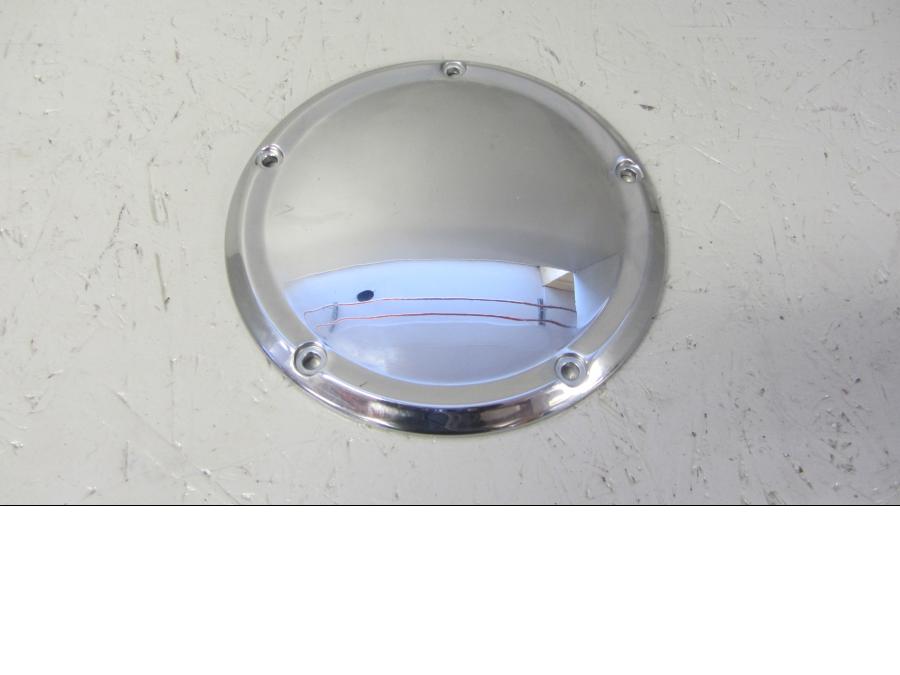 Framsidan på Kopplingskåpa från en H-D Ultra Limited FLHTK -2017 motorcykel.