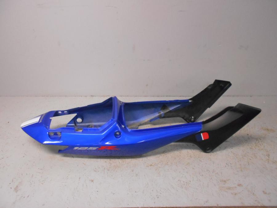 Höger sida på Bakvinge från en Honda CBR 125 R -2006 motorcykel.