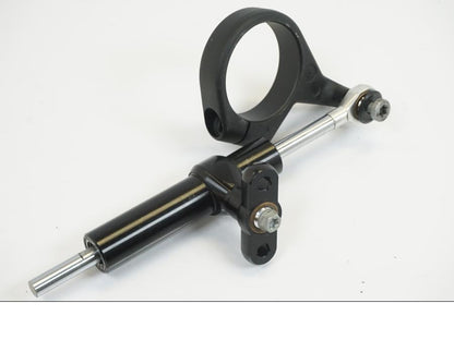 Snett uppifrån på Styrdämpare från en KTM 1190 Adventure -2013 motorcykel.