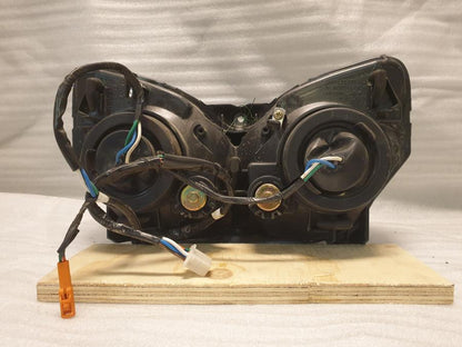 Höger sida på Strålkastare från en Honda CBR 125 R -2004 motorcykel.