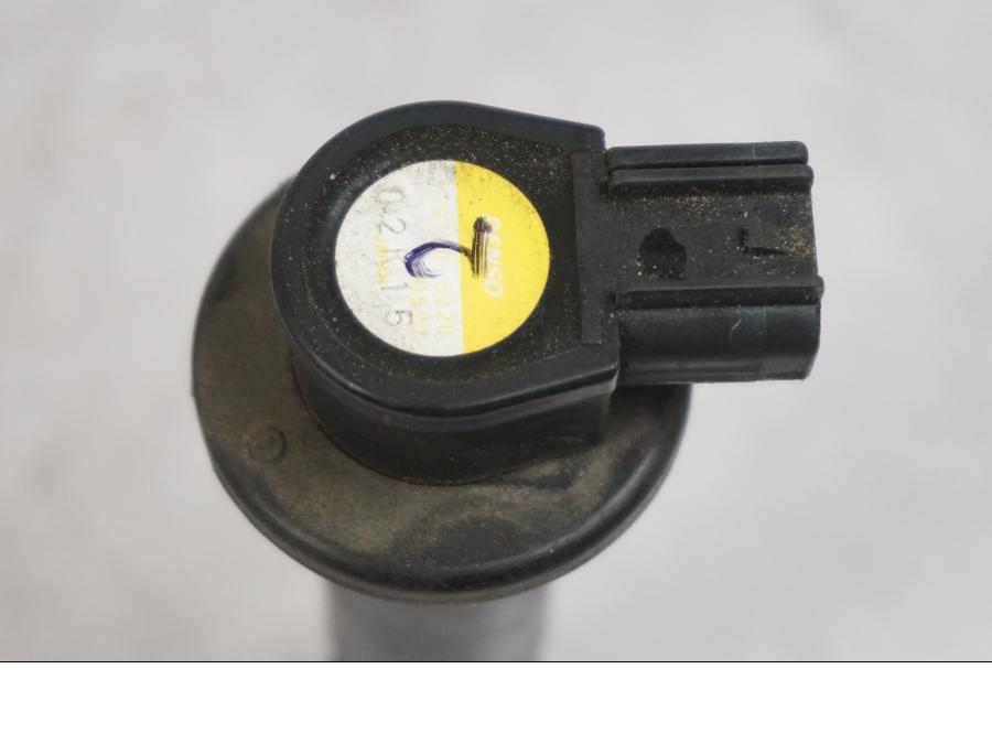 Snett uppifrån på Tändspole från en Triumph Tiger -2009 motorcykel.