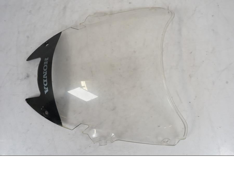 Baksidan på Vindruta från en Honda VTR 1000 F -1997 motorcykel.