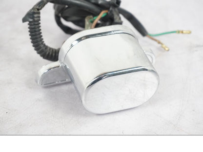 Baksidan på Skyltbelysning från en Honda VT 600 C -1998 motorcykel.