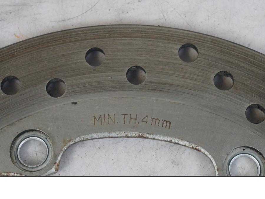 Vänster sida på Bromsskiva från en Honda CBR 1100 XX -1999 motorcykel.