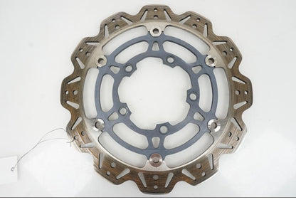 Framsidan på Bromsskiva från en Suzuki GSX-R 1000 -2007 motorcykel.