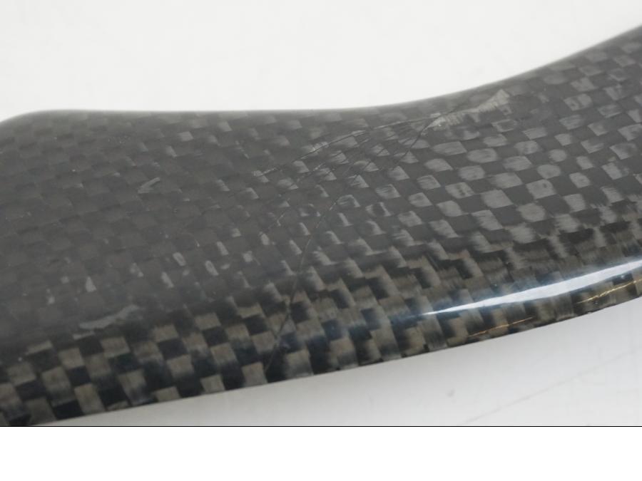 Snett uppifrån på Kedjeskydd från en Aprilia RS 125 -2008 motorcykel.