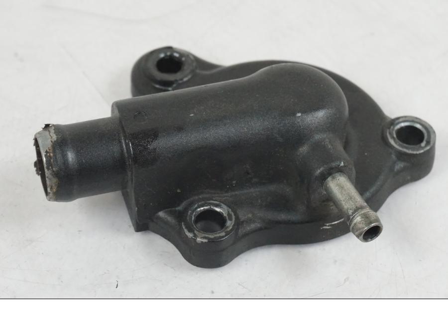 Baksidan på Vattenpump från en Honda CBR 125 R -2006 motorcykel.