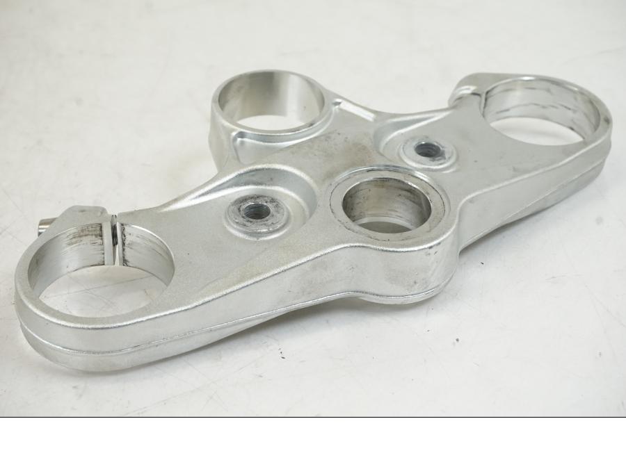 Baksidan på Gaffelkrona från en Aprilia Tuono V4R -2011 motorcykel.